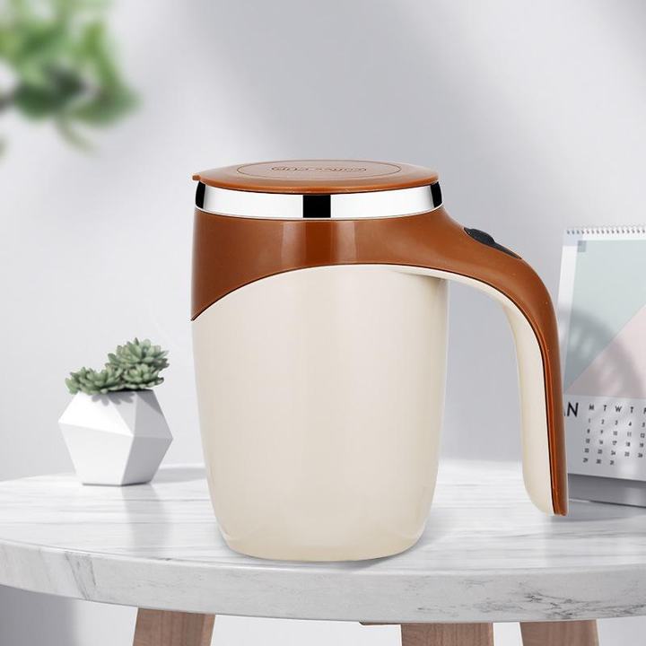 Self-Stirring Coffee Mug in use